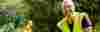 Man smiling at the camera whilst volunteering on the NCN