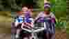 Adapted cycle riders on a traffic-free route