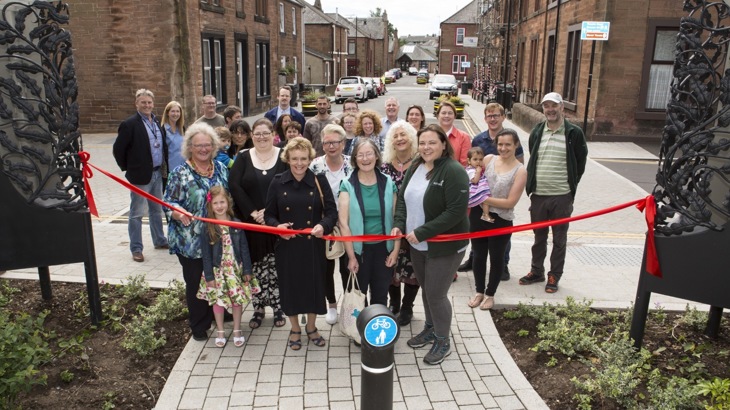 cutting the ribbon with the community to celebrate new street design in Dumfries