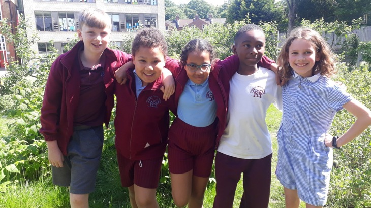 Children From Witherfield School Pose For A Photo