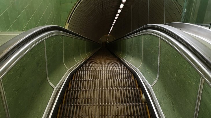 The wooden escalators of the Tyne river foot tunnel, which have been painted a dark green colour