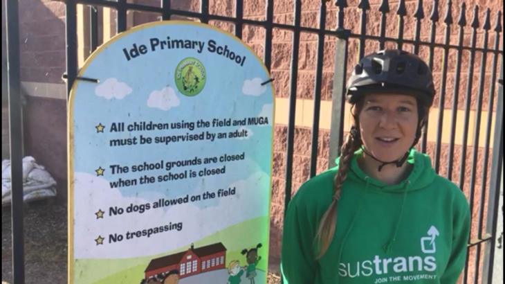 Walk Wheel Cycle Trust officer outside primary school gate 