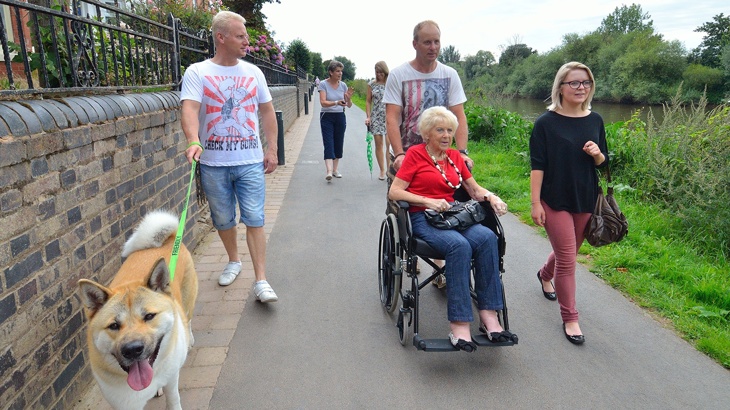 People using a traffic-free path next to a canal