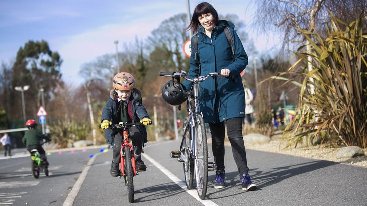 Claire Montgomery With Her Son Alex Leaving School On Their Bikes