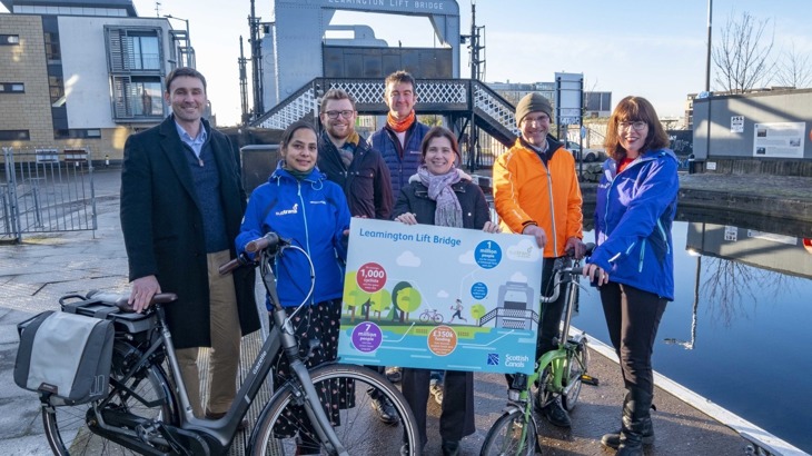 People gathered at Leamington Lift Bridge on National Cycle Network to mark 100,000 journeys
