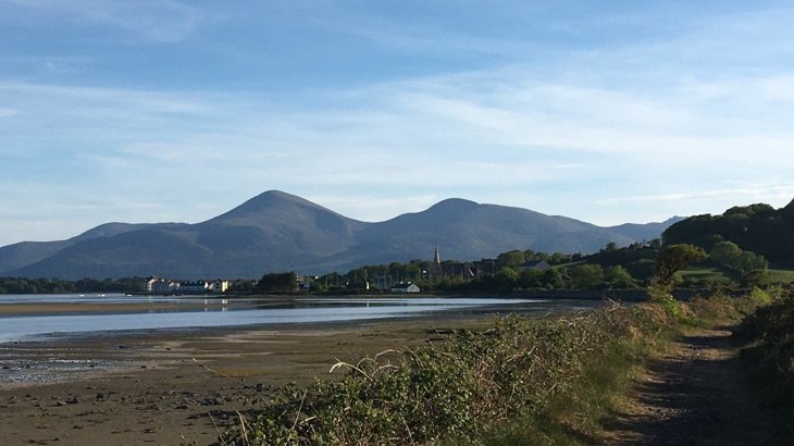 National Trust path at Dundrum with view of the Mourne mountains. Outdoor scenes from Newry, Mourne and Down District Council area