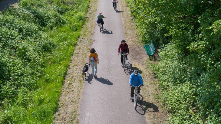 People Walking And Cycling On Fallowfield Loop