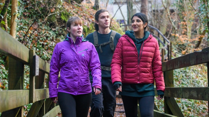 Three walkers on bridge in Killecrankie Gorge, National Route 7