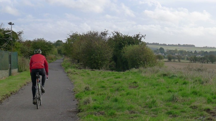 A man cycles along the Swindon to Marlborough path 