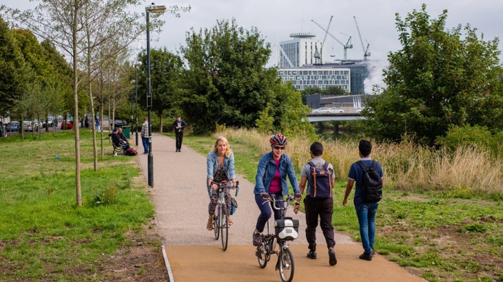 people on bikes and walking on traffic free trail